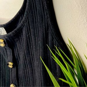 thick strapped black top with buttons